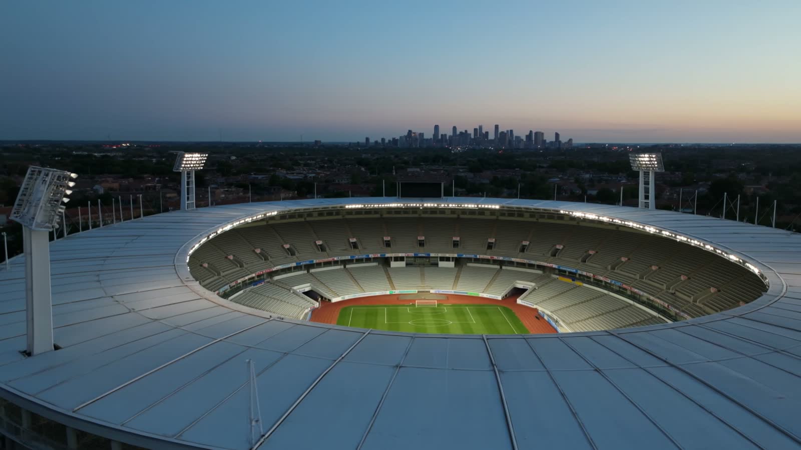 An open air stadium at dusk