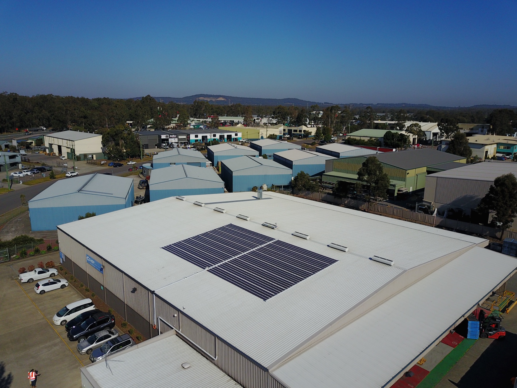 Aerial view of an industrial roof in Australia with Printed Solar installed