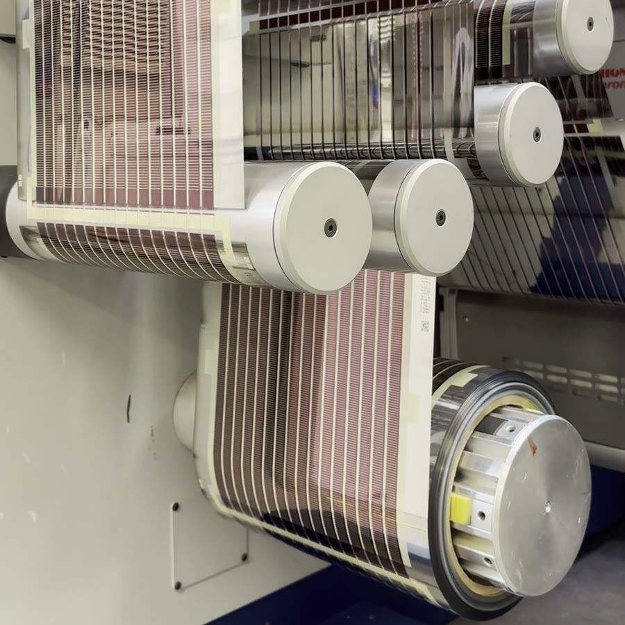 Printed Solar running over the rollers of the pilot press