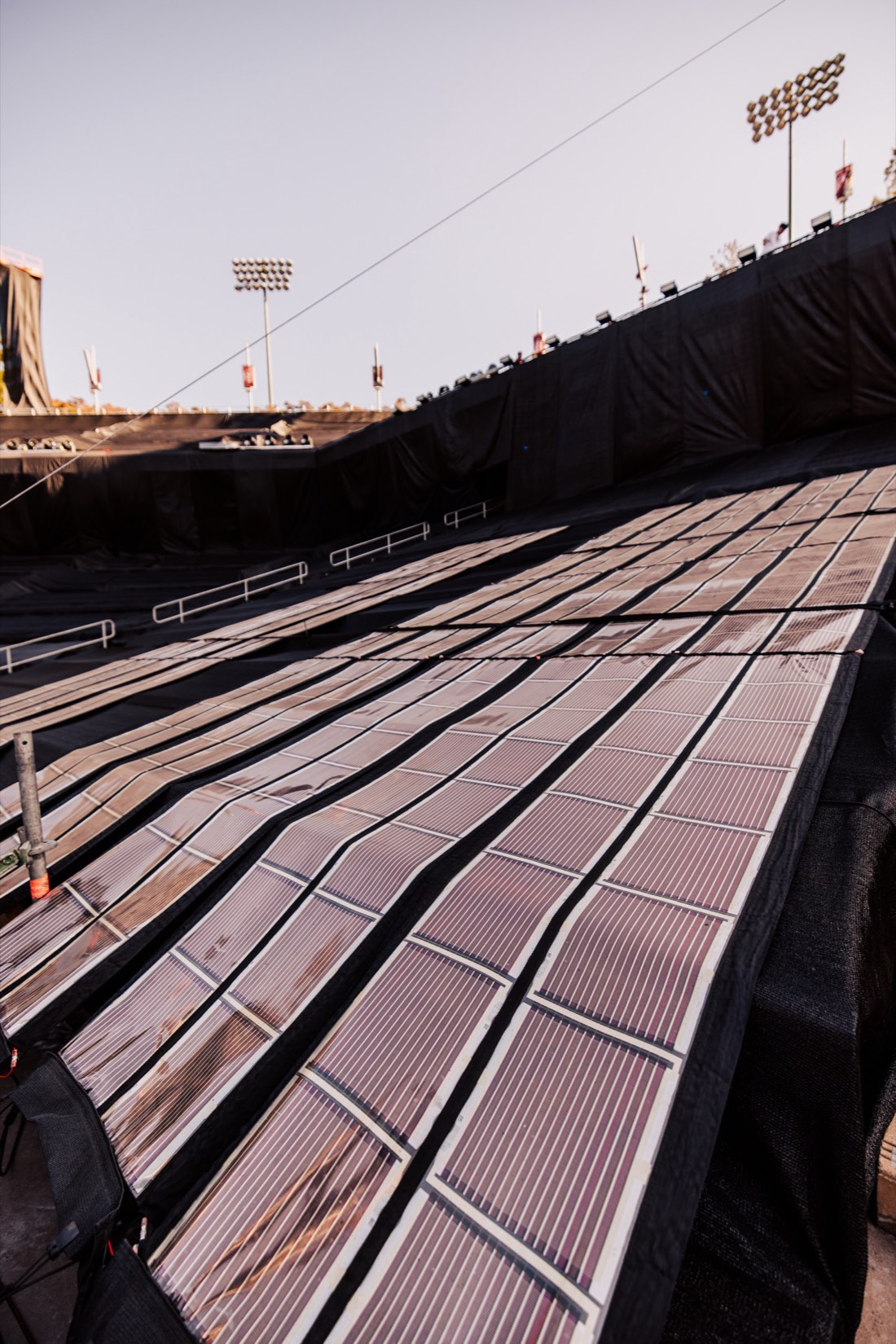 Rows of Printed Solar across stadium seating on Coldplay&rsquo;s world tour